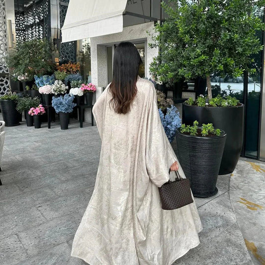 Mandotos Muslim robe abaya in black with flowing fabric and elegant design, suitable for modest Islamic attire.