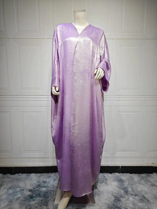 Mandotos Muslim robe abaya in black with flowing fabric and elegant design, full-length traditional Islamic dress.