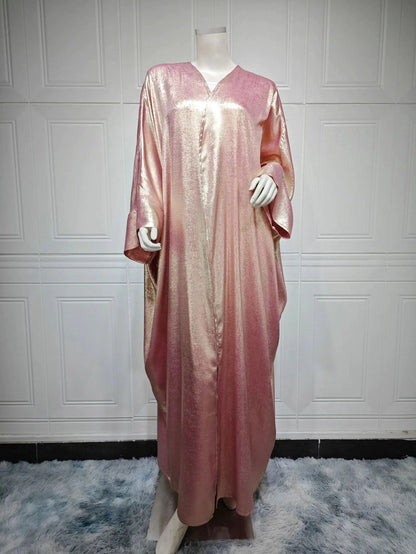 Mandotos Muslim robe abaya in black with intricate embroidery, flowing fabric, traditional modest dress for women.