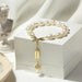 Mandotos luxury jewelry featuring a natural zircon and pearl bracelet with elegant design and fine craftsmanship.
