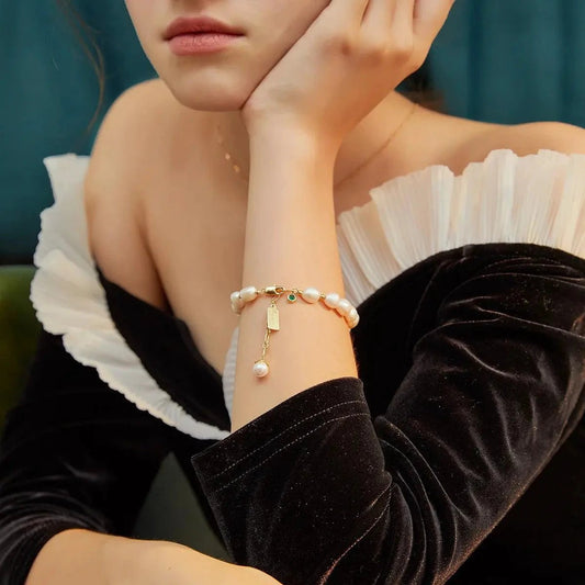 Luxury MANDOTOS natural zircon pearl bracelet featuring elegant white pearls and sparkling zircon accents.