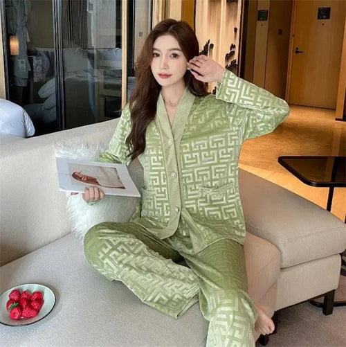 Gold velvet women's pajamas set by MANDOTOS, featuring a comfortable long-sleeve top and matching pants for cozy lounging.