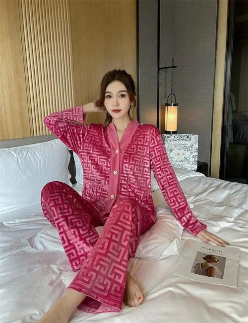 Gold velvet women's pajamas suit by MANDOTOS, featuring a luxurious long-sleeve top and matching relaxed-fit pants.
