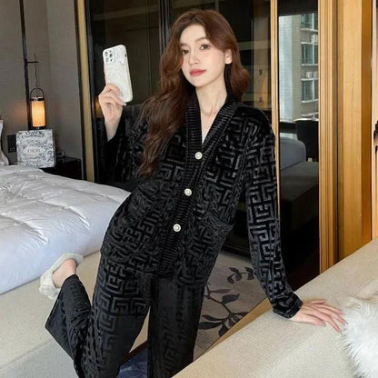 Women's gold velvet pajamas suit by MANDOTOS featuring a comfortable, luxurious pajama top and pants set.