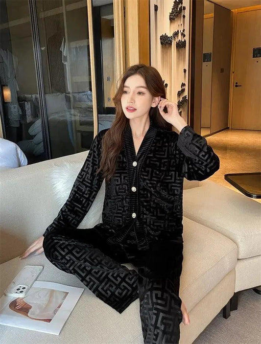 Women's gold velvet pajamas set by MANDOTOS featuring a comfortable, luxurious pajama suit with a relaxed fit and soft fabric.