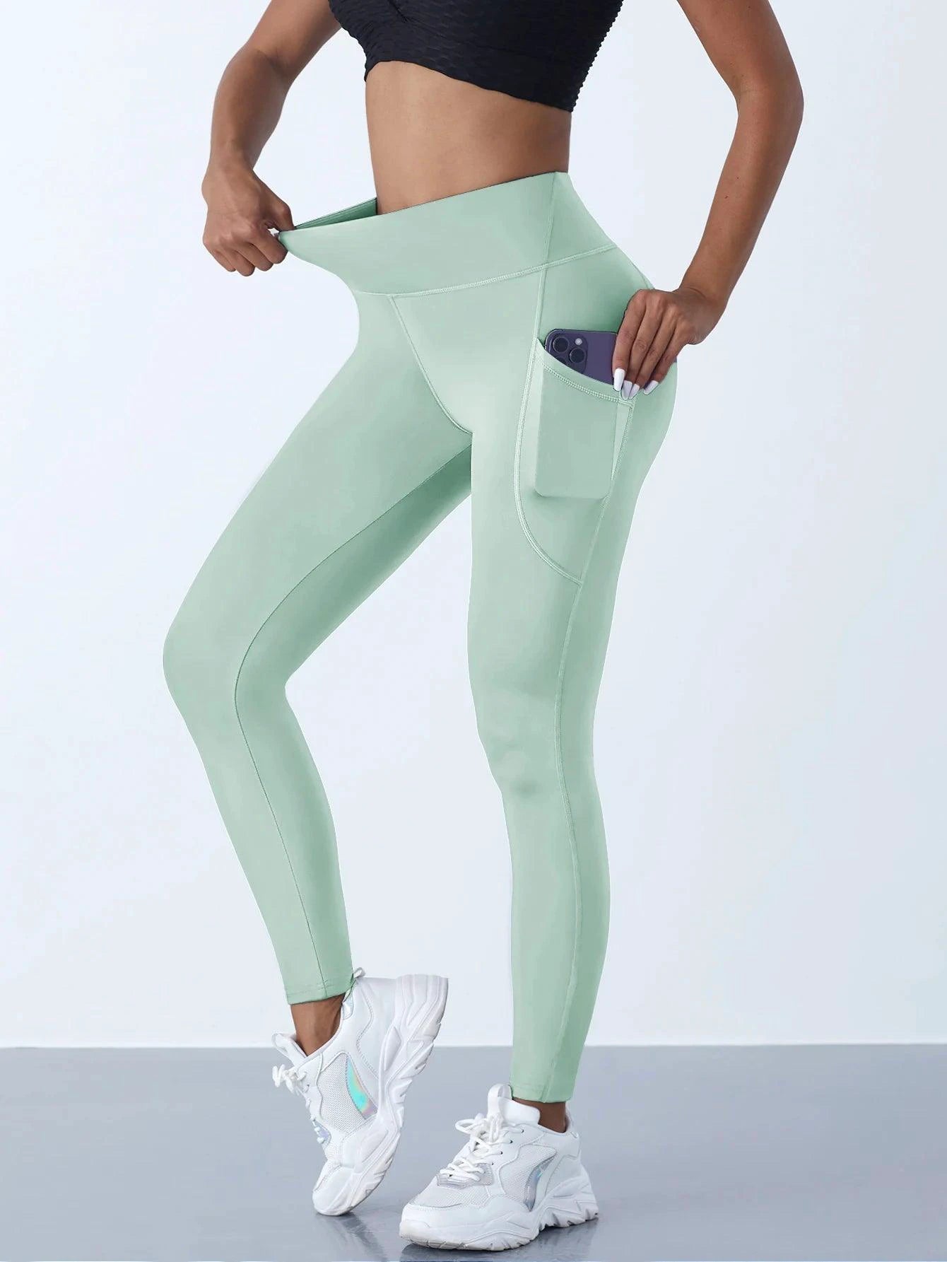 Mandotos high waist women's stretch yoga leggings with pockets, push-up fit, solid color, suitable for fitness, running, and sports activities.