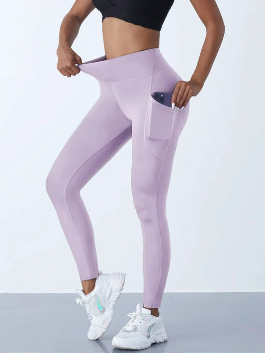 Mandotos high waist women's stretch yoga leggings with pockets, designed for fitness, running, and sports in solid color.
