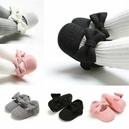 Mandotos newborn soft shoes in pastel colors, featuring plush fabric and flexible soles for comfortable baby footwear.
