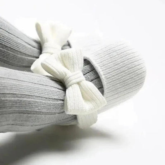 Soft newborn shoes by MANDOTOS, featuring comfortable fabric and adorable design for baby’s first steps.