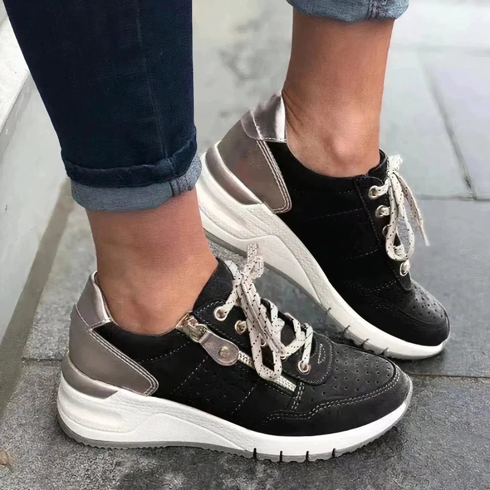 Mandotos orthopedic shoes in black with supportive soles and adjustable straps, designed for comfort and foot health.