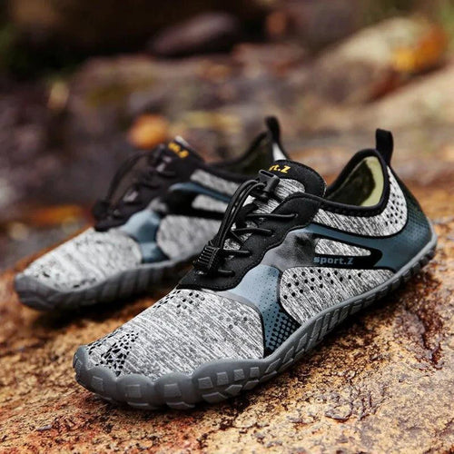 Mandotos outdoor hiking shoes in earthy tones with rugged soles, designed for trail walking and outdoor adventures.