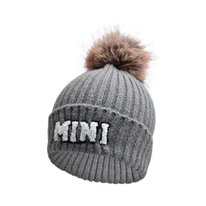 Set of three MANDOTOS parent-child matching beanie hats for mama, papa, and baby, perfect for winter warmth and family photos.
