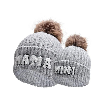 Matching parent and child winter beanie hats set by MANDOTOS, includes three cozy knit hats for mama, papa, and baby.