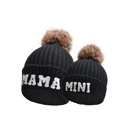 Matching parent-child beanie hats set by MANDOTOS, includes three cozy winter knit hats for mama, papa, and baby.