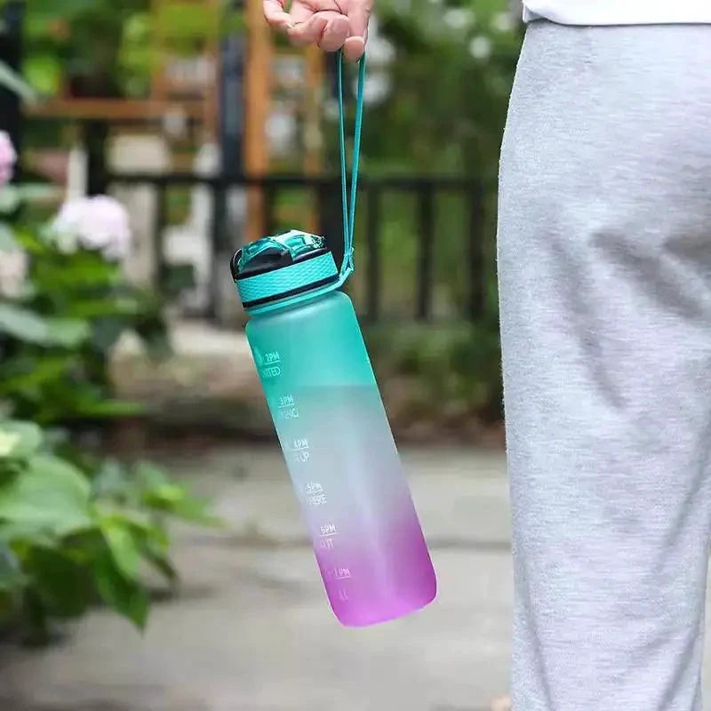 Mandotos PeakHydrate Motivational Bottle with colorful design and inspirational quote for staying hydrated throughout the day.