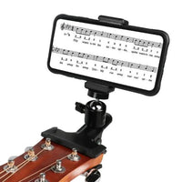 Mandotos phone guitar clip stand holding a smartphone, adjustable clip for easy setup and stable support for music or videos.