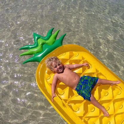 Colorful pineapple-shaped pool float by MANDOTOS with fun tropical design, perfect for summer relaxation and poolside fun.