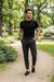 Mandotos men's plaid print casual trousers with loose fit and thin fabric, suitable for relaxed and comfortable wear.
