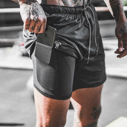 Mandotos Pocket Compression Shorts shown on a model, featuring a snug fit, elastic waistband, and built-in pocket for athletic activities.