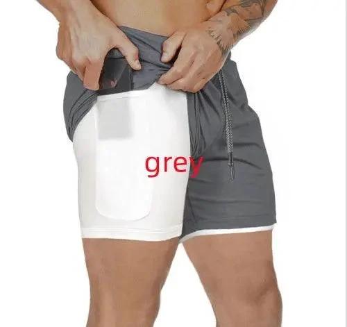 Mandotos Pocket Compression Shorts showing a close-up of black athletic shorts with side pockets for sports and training.