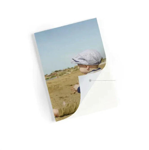 Portable MANDOTOS Bluetooth photo printer for on-the-go printing, showing compact design with paper output and wireless connectivity.