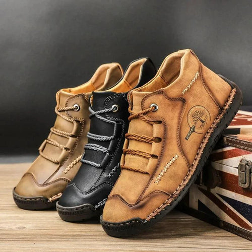 Mandotos premium microfiber leather boots showing polished black leather with stylish ankle-high design and sturdy sole.