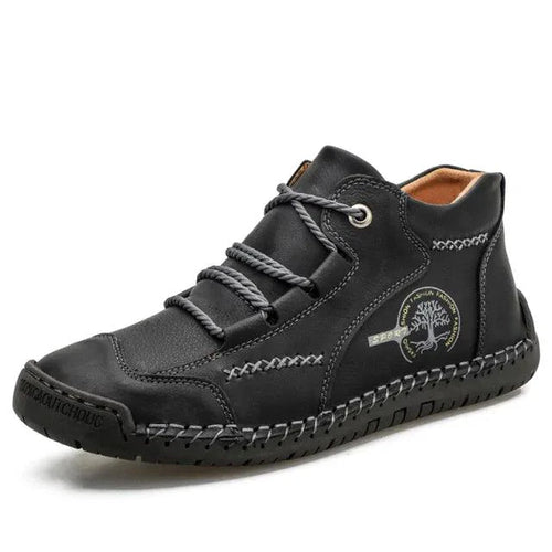 Mandotos premium microfiber leather boots with stylish design and durable construction, showcasing their sleek ankle-high silhouette.