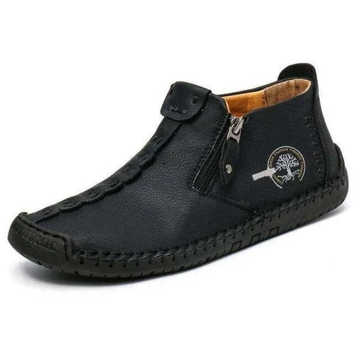 Mandotos premium microfiber leather boots showing sleek design and smooth leather texture on a neutral background.