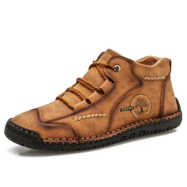 Mandotos premium microfiber leather boots showing ankle-high design, stylish stitching, and sleek black finish.