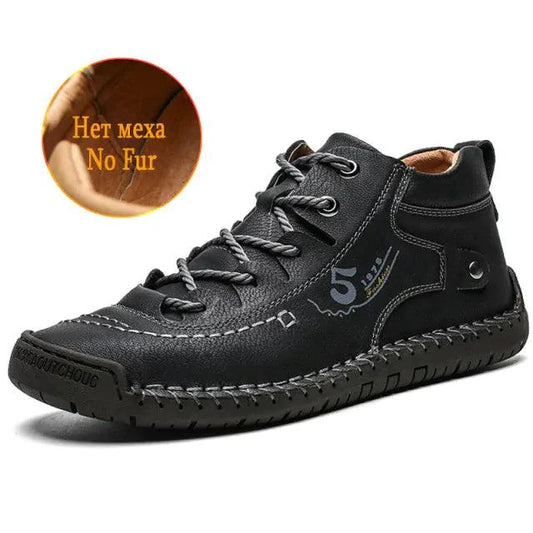 Mandotos premium microfiber leather boots showing sleek black design with textured finish and sturdy soles.