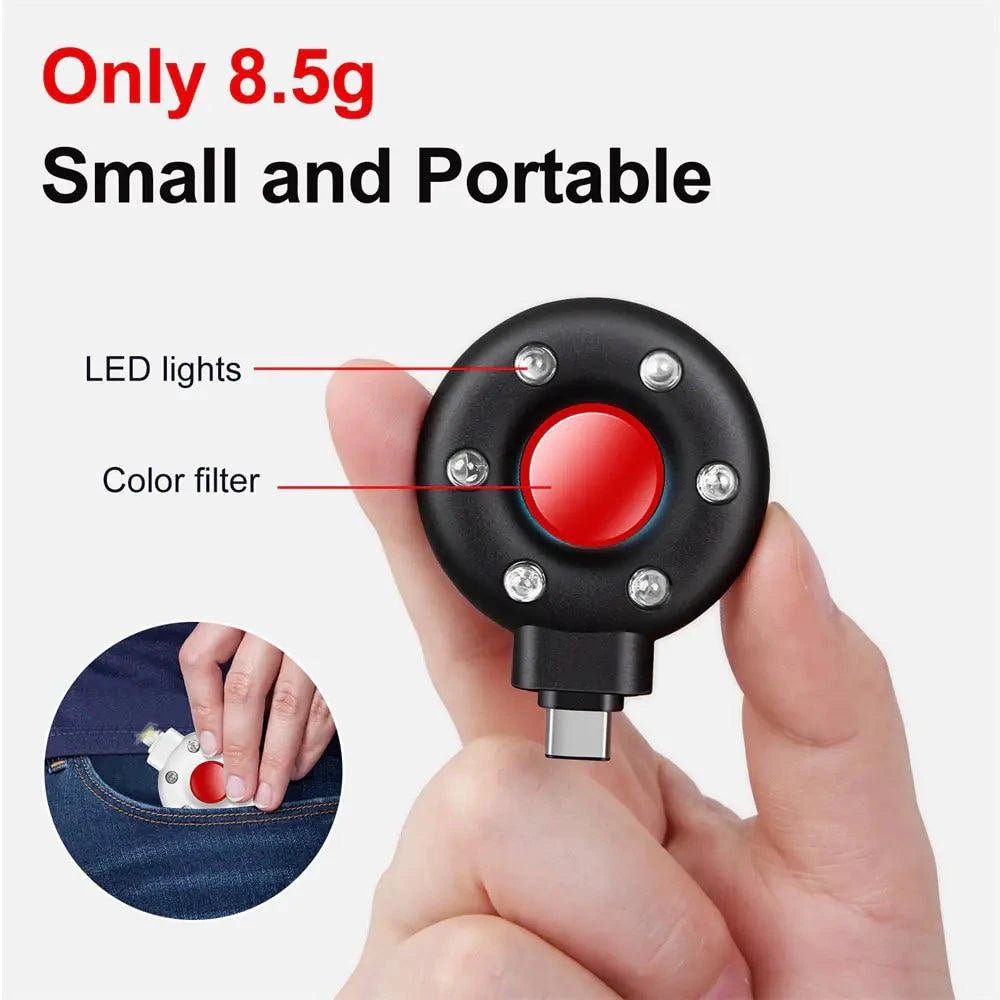 MANDOTOS PrivacyGuard camera detector, portable privacy shield device with LED indicator and compact design for detecting hidden cameras.