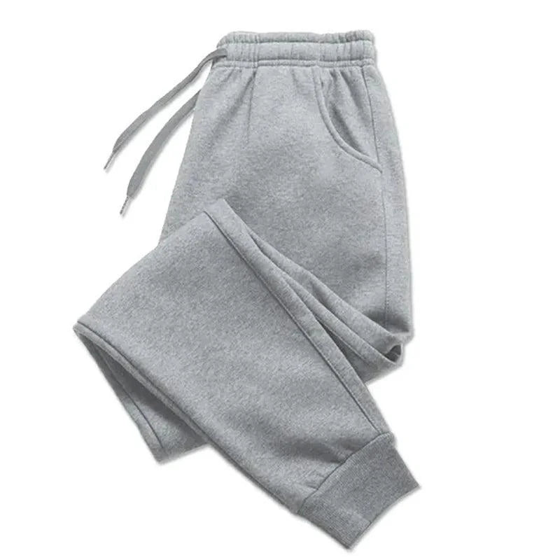 Mandotos PUAIA print men's jogger pants in solid color, suitable for autumn/winter, sporty, loose fit streetwear trousers.