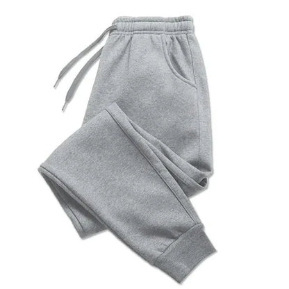 Mandotos PUAIA print men's jogger pants in solid color, suitable for autumn/winter, sporty, loose fit streetwear trousers.
