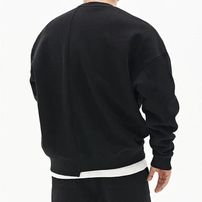 Loose men's pullover round neck sweater by MANDOTOS, showcasing a cozy fit and classic style in neutral fabric.