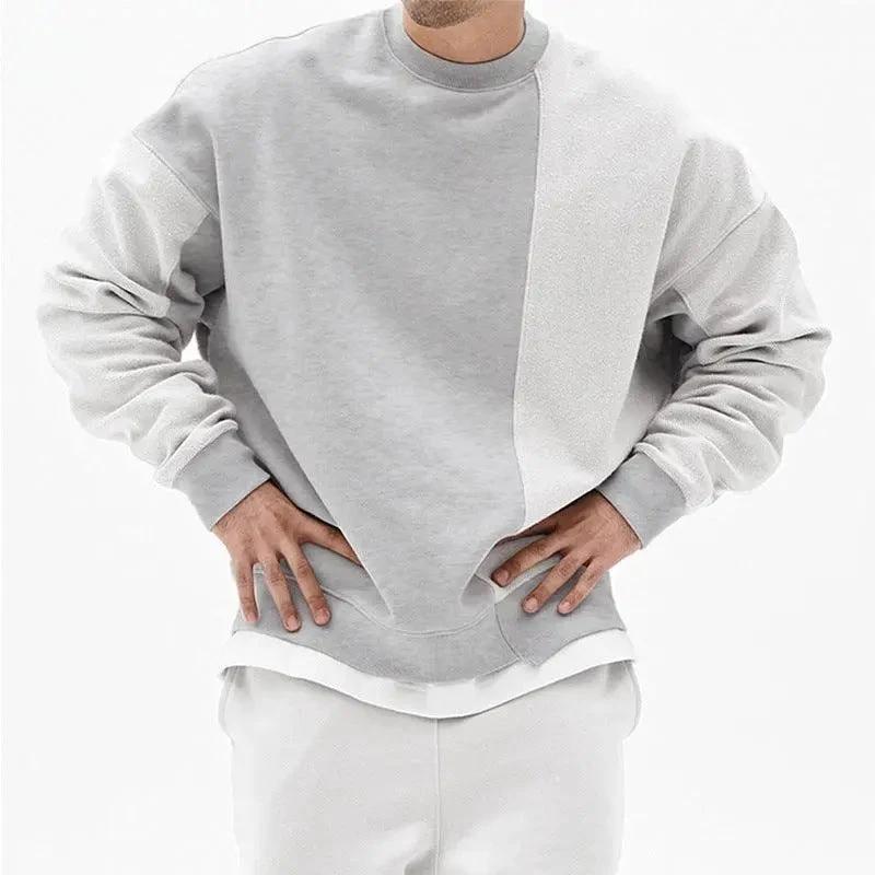 Loose men's round neck pullover sweater by MANDOTOS, featuring a comfortable fit and casual style in the image.