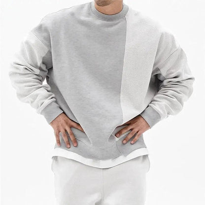 Loose men's round neck pullover sweater by MANDOTOS, featuring a comfortable fit and casual style in the image.