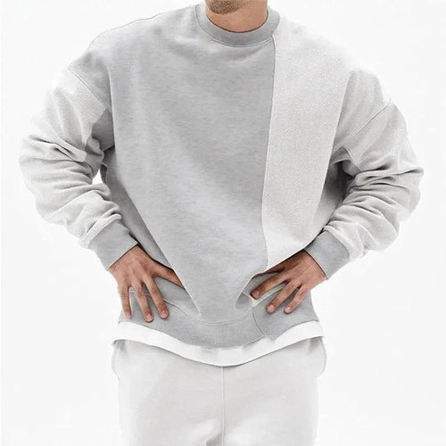 Loose men's round neck pullover sweater by MANDOTOS, featuring a comfortable fit and casual style in the image.