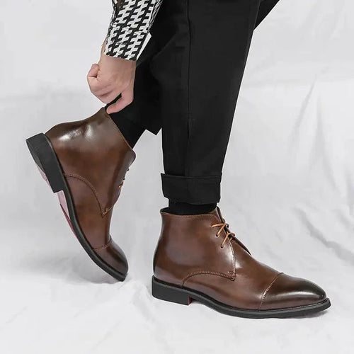 Mandotos red bottom leather boots showcasing stylish pointed toes and sleek design for fashionable footwear.