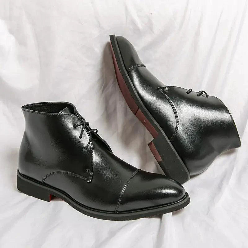 Mandotos red bottom leather boots with sleek design and pointed toe, stylish footwear for women.