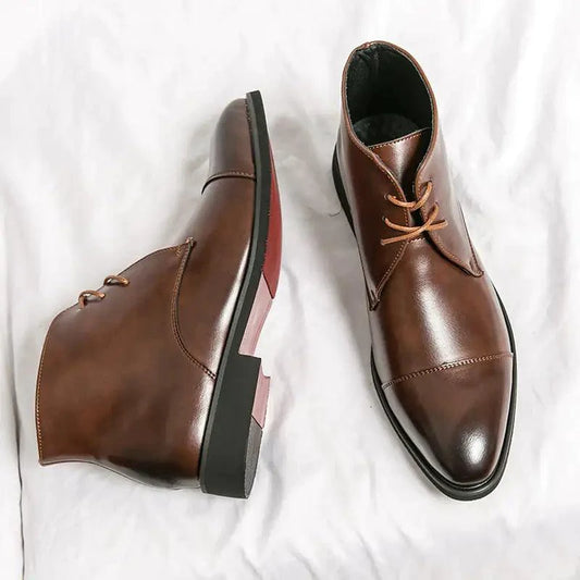 Mandotos red bottom leather boots with sleek design and pointed toe, stylish footwear for casual or formal wear.