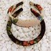Mandotos Retro Blossom Hairband featuring vibrant floral design and vintage-inspired style, perfect for adding a charming touch to any hairstyle.