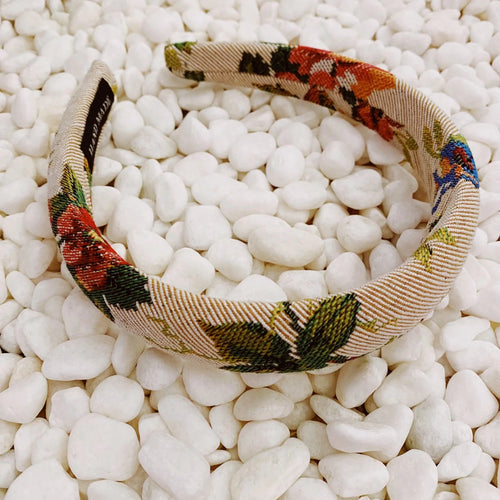 Mandotos Retro Blossom Hairband with floral design and vintage style, perfect for adding a charming touch to your hairstyle.