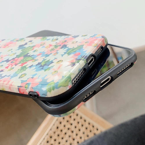 Mandotos Retro Daisy Phone Case with colorful floral design on a protective phone cover for smartphones.