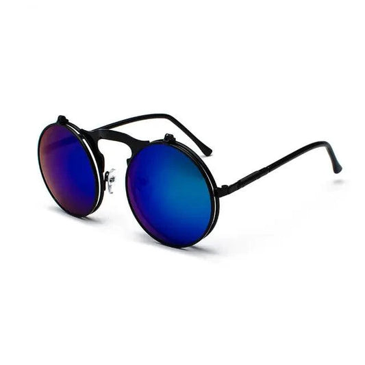 Retro flip steampunk sunglasses by MANDOTOS featuring vintage-inspired metal frames and tinted lenses.