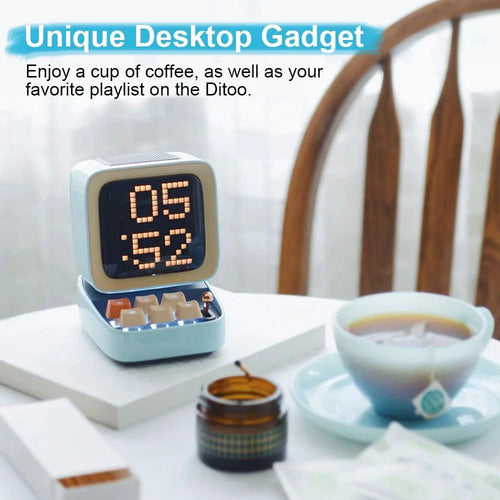 Mandotos retro pixel art Bluetooth speaker and alarm clock with colorful pixel design and digital display.