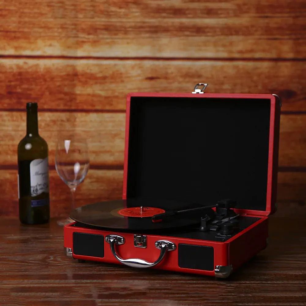 Mandotos RetroSound portable turntable with vintage design, wood finish, and built-in speakers for listening to vinyl records on the go.