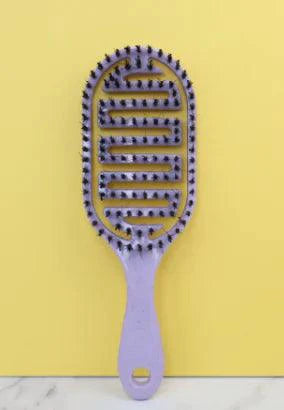 Mandotos ReviveScalp Scalp Soother Comb with ergonomic design for gentle scalp relaxation and hair comfort.