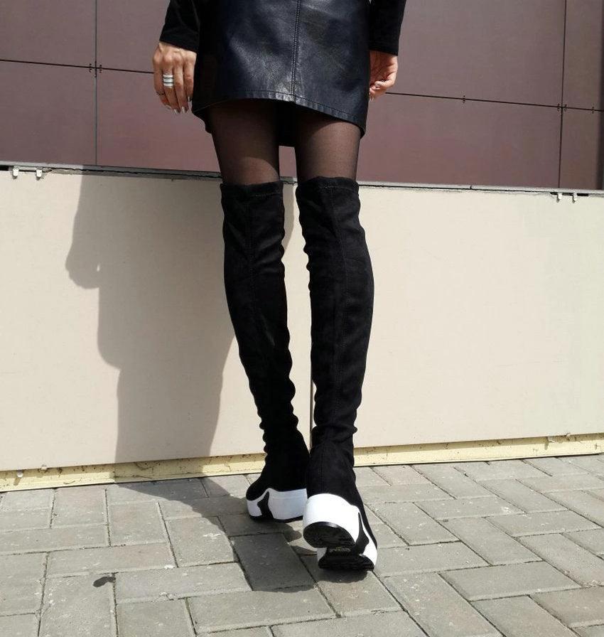 Mandotos round toe sports high heel over knee boots in black, featuring sleek design and knee-high length for stylish footwear.
