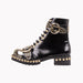 Mandotos rugged studded buckle boots featuring metal buckle accents and sturdy leather construction.
