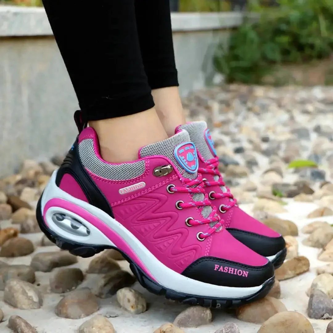 Mandotos running shoes with breathable mesh upper and cushioned soles, designed for comfortable athletic performance.